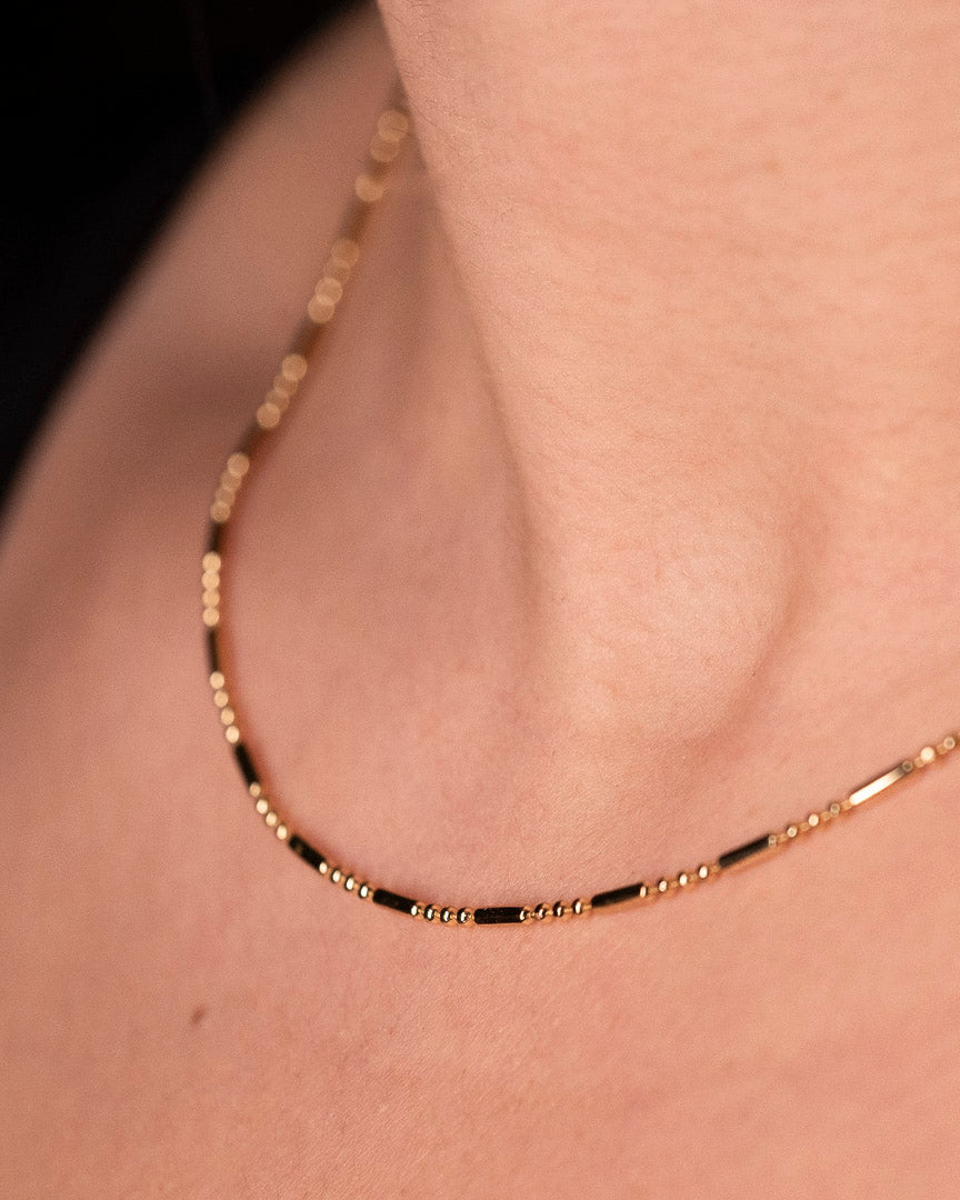 dashed dotted necklace gold layers